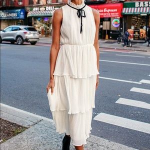 Stunning White Pleated Tiered Midi Dress
Lulus